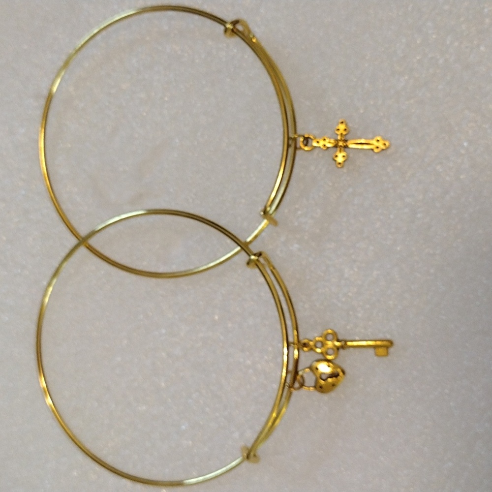 Two beautiful faux gold wire charm bracelets.